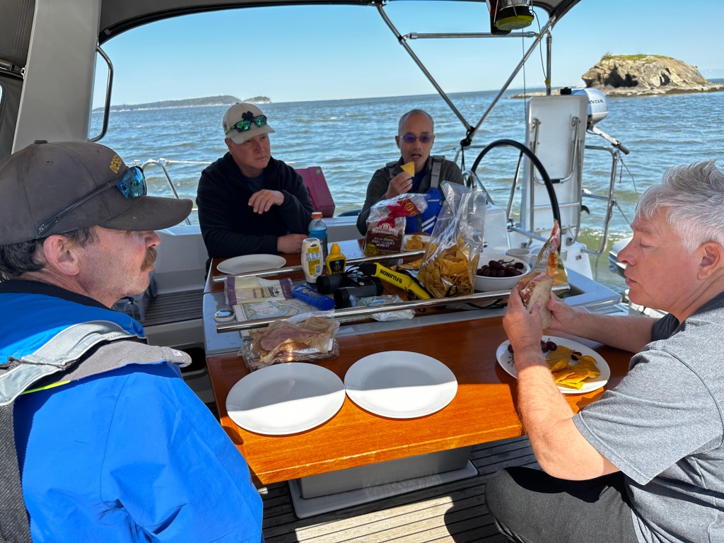 picnic lunch in a sailboat's cockpit